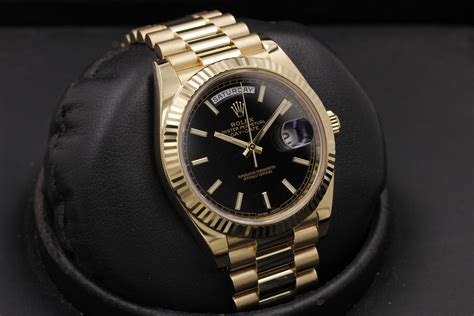 rolex da date gold schwarz|Rolex Day-Date 40 18 ct.